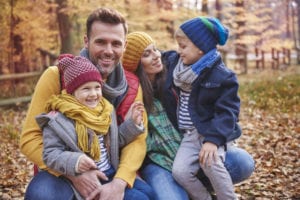 photo of family in woods