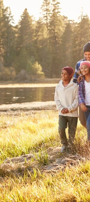 family on hiking trail