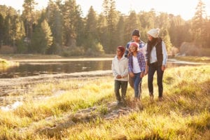 family on hiking trail