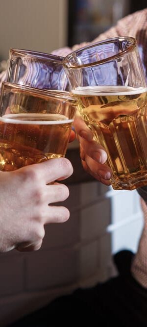 friends toasting with beer