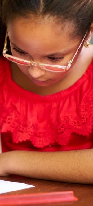 girl in class with red shirt