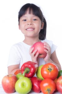 girl with vegetables and fruit