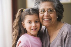grandma hugging girl