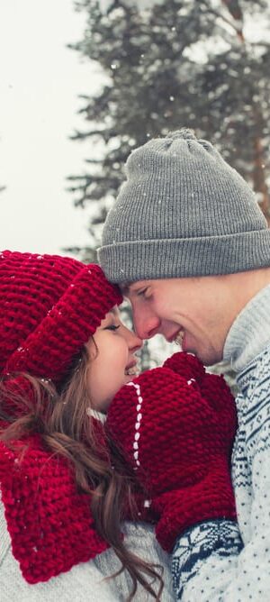 happy couple outdoors in snow