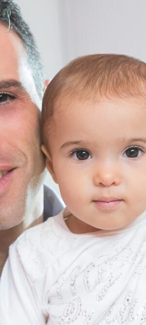 happy dad and baby