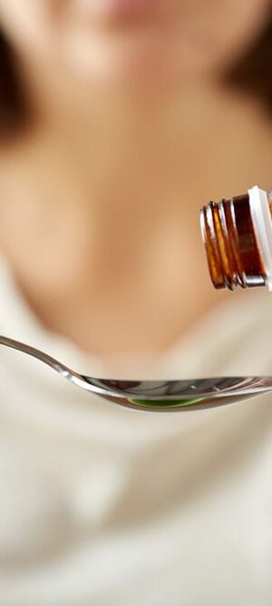 liquid medicine and spoon
