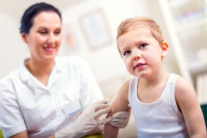 photo of baby with vaccine