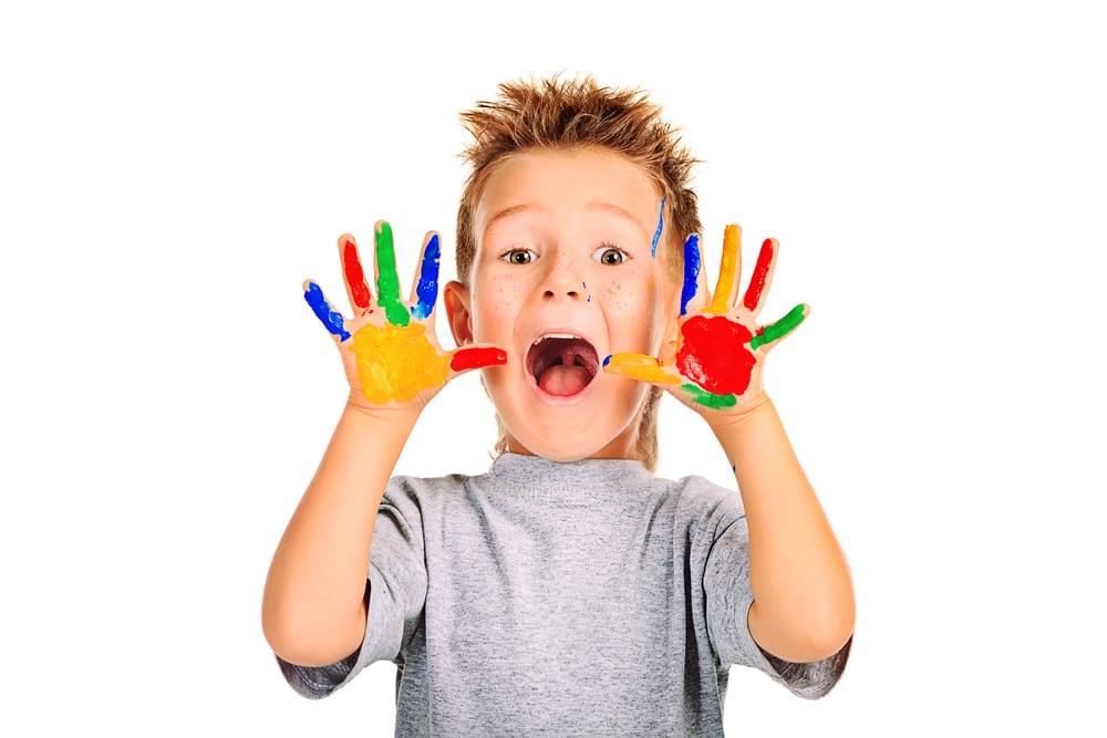 photo of boy with painted hands