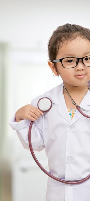 little girl in doctor clothes