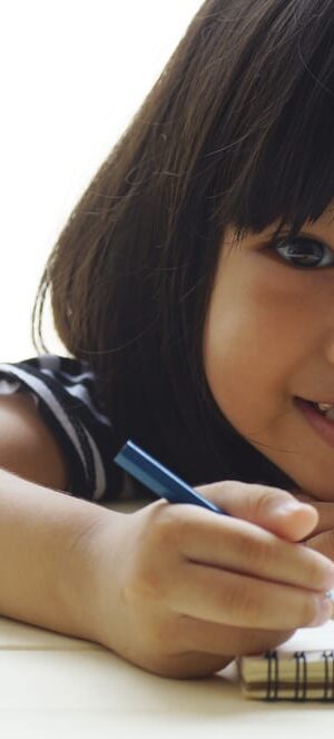 little girl with notebook