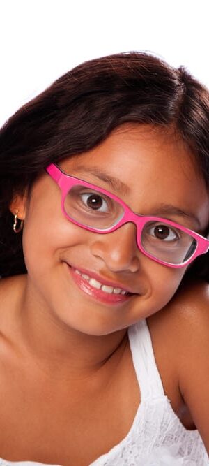 little girl with pink glasses