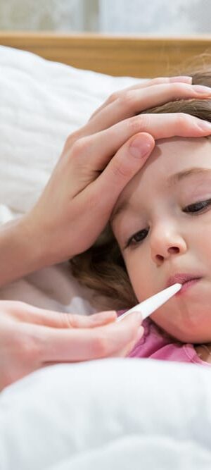 little girl with thermometer