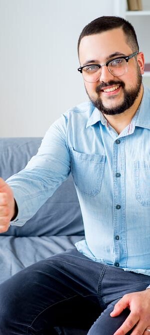 man on office couch