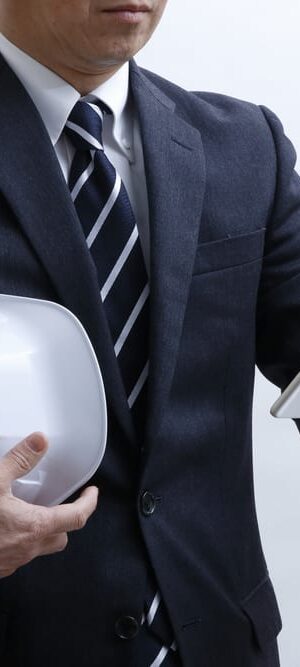 man with helmet and tablet