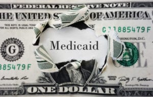 photo of medicaid word with money