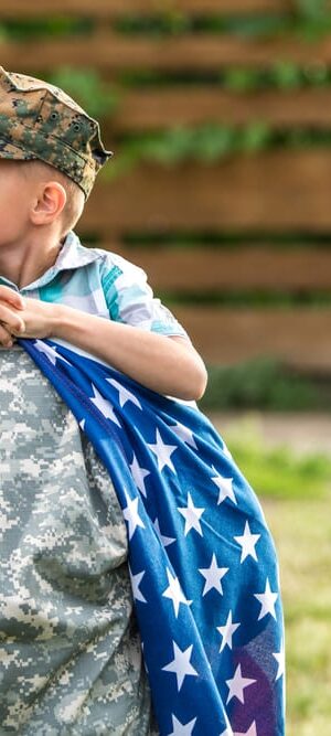 military dad and son hugging