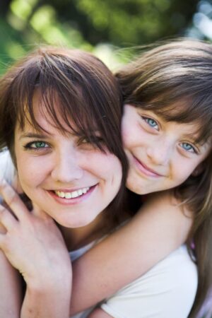mom and daughter with blue eyes - Wyoming Department of Health