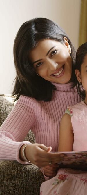 mom and girl with book