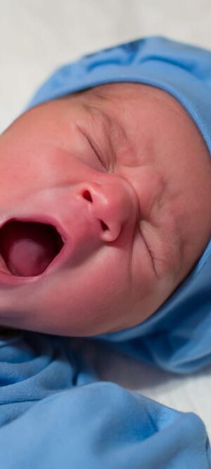 newborn baby yawning