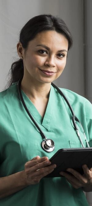 nurse holding tablet