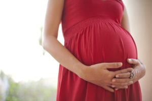 photo of pregnant woman torso