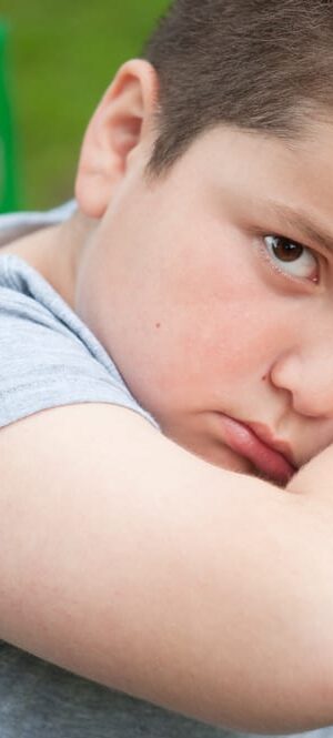 sad boy on playground