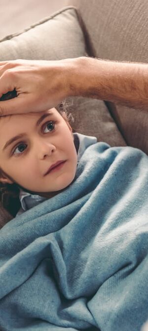 sick little girl with dad