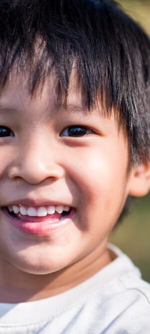 smiling boy outdoors