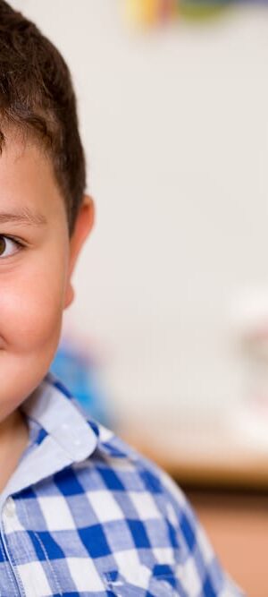 smiling boy with chubby cheeks