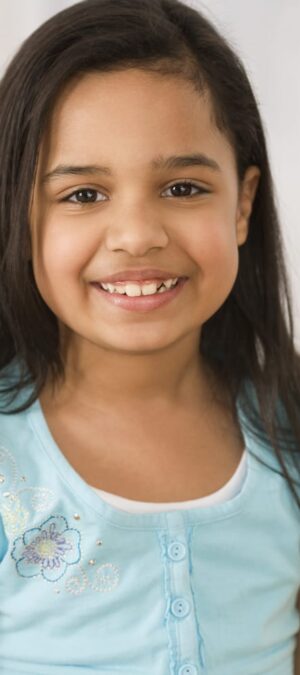 smiling little girl with long hair