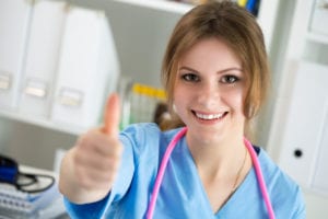 nurse with thumbs up