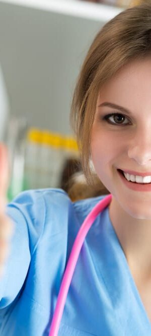 smiling nurse with thumbs up