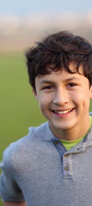 teen boy on sports field