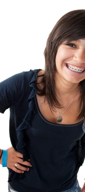teen girl with braces laughing