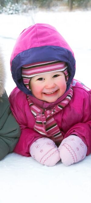three children in snow