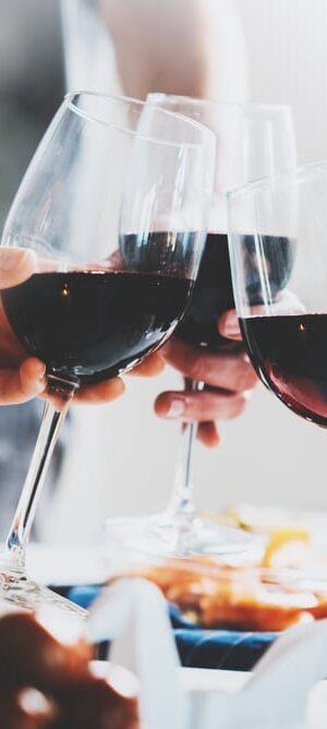 toasting with red wine