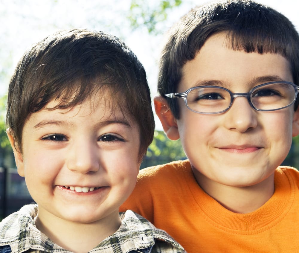 two brothers outside - Wyoming Department of Health