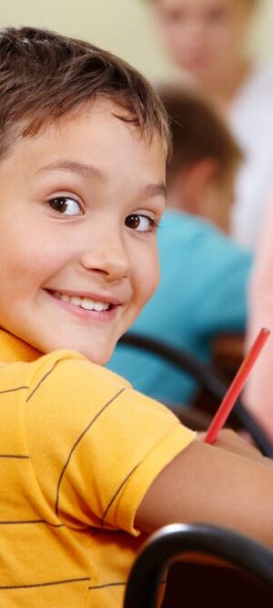 young boy in classroom