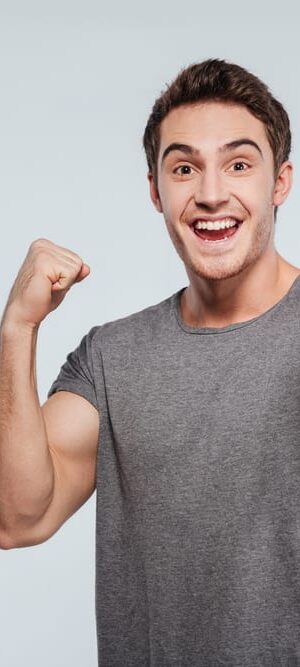 young man celebrating indoors 2