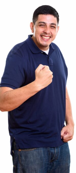 young man celebrating indoors