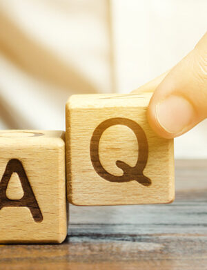 FAQ letters on wood blocks
