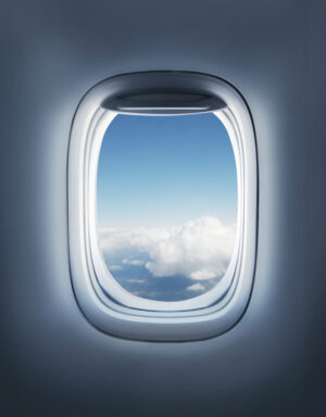 airplane window and clouds