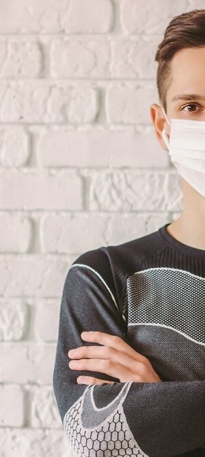 athletic guy with face covering