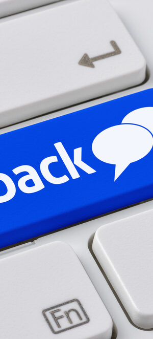 blue feedback button on computer