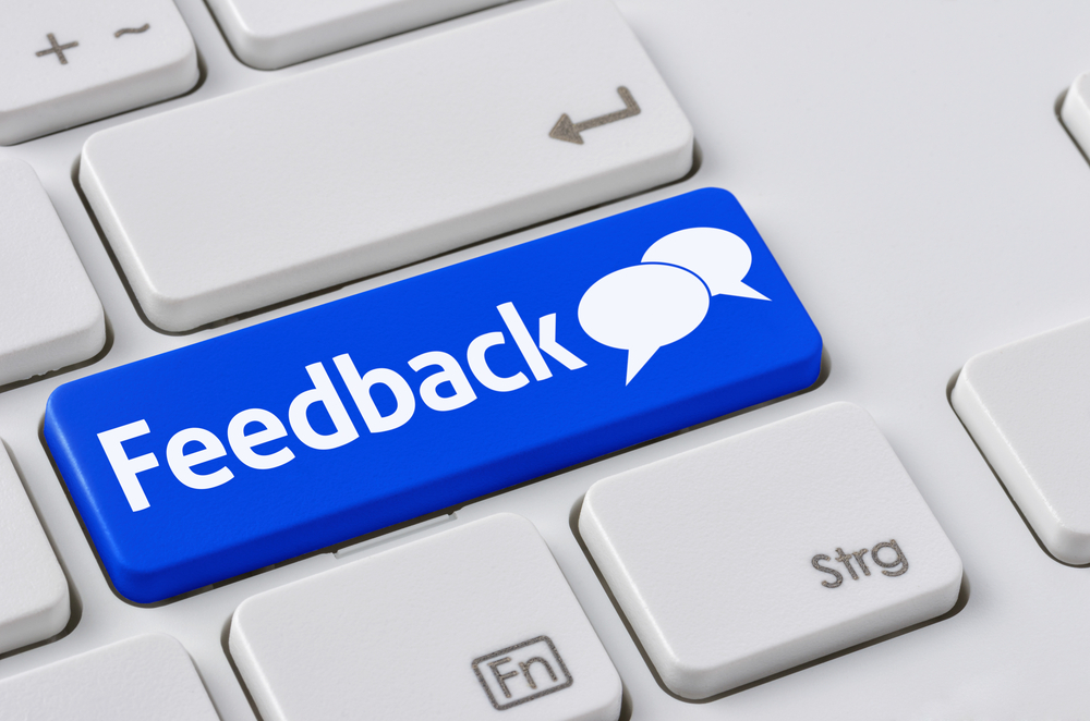 blue feedback button on computer