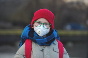 boy in winter with mask