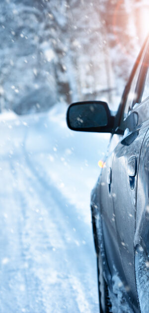 close up of car on winter road