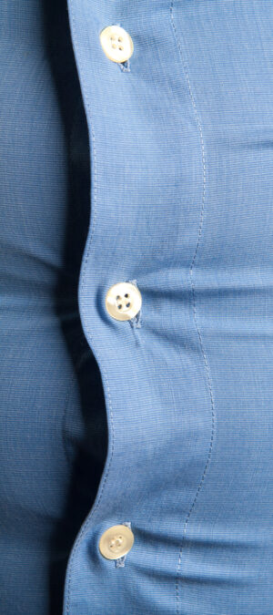 close up of shirt that doesn’t fit