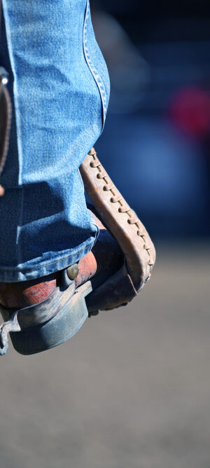cowboy boot in stirrup