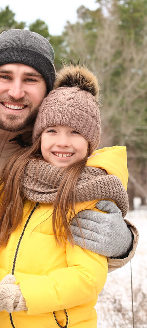 dad and kids outside in winter